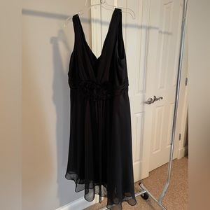 Lovely V feminine cut cocktail dress with floral detail